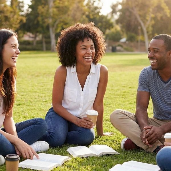 Group talking in field